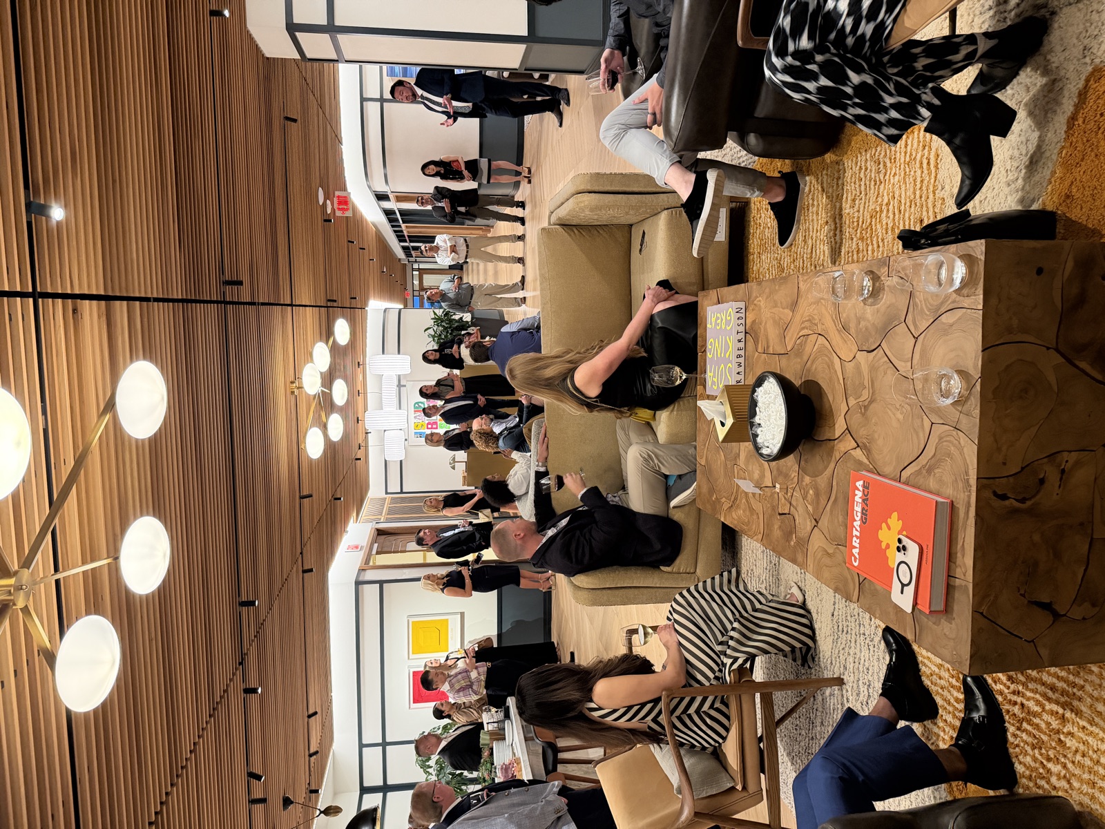 Guests gathered for a discussion at the PushFire office in Houston.